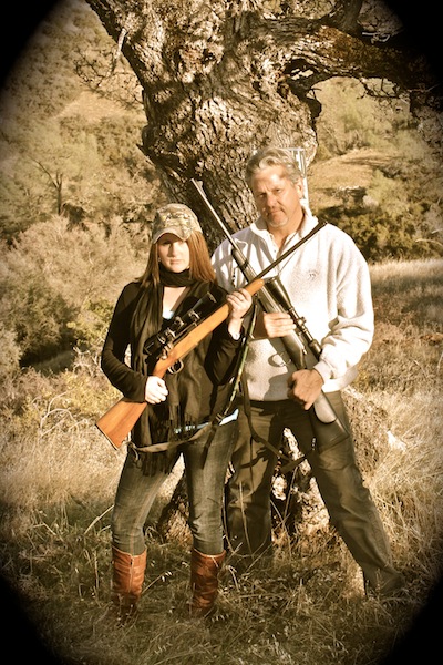 Father daughter portrait with rifles