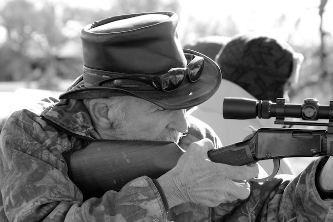 Grandpa shooting a rifle